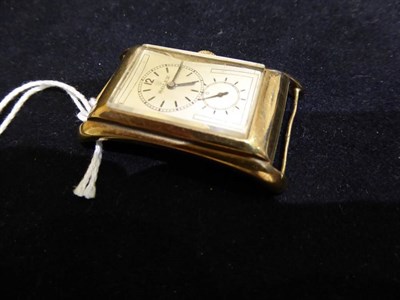 Lot 65 - A Rare 9ct Gold Rectangular Curved Flared Sided Wristwatch, model: Prince Brancard, ref: 1490,...