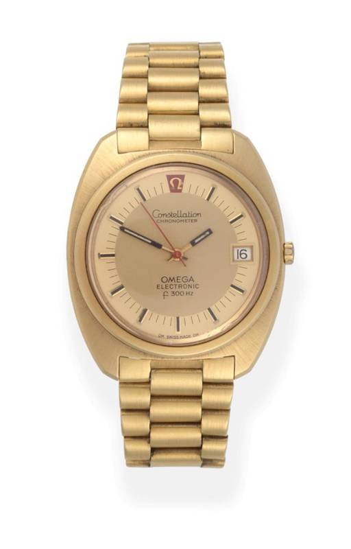 Lot 66 - An 18ct Gold Calendar Centre Seconds Electronic Wristwatch, signed Omega, Electronic F300Hz, model