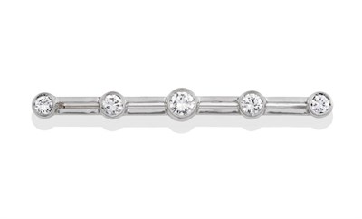 Lot 98 - A Diamond Five Stone Bar Brooch, parallel bars with round brilliant cut diamonds collet set at...