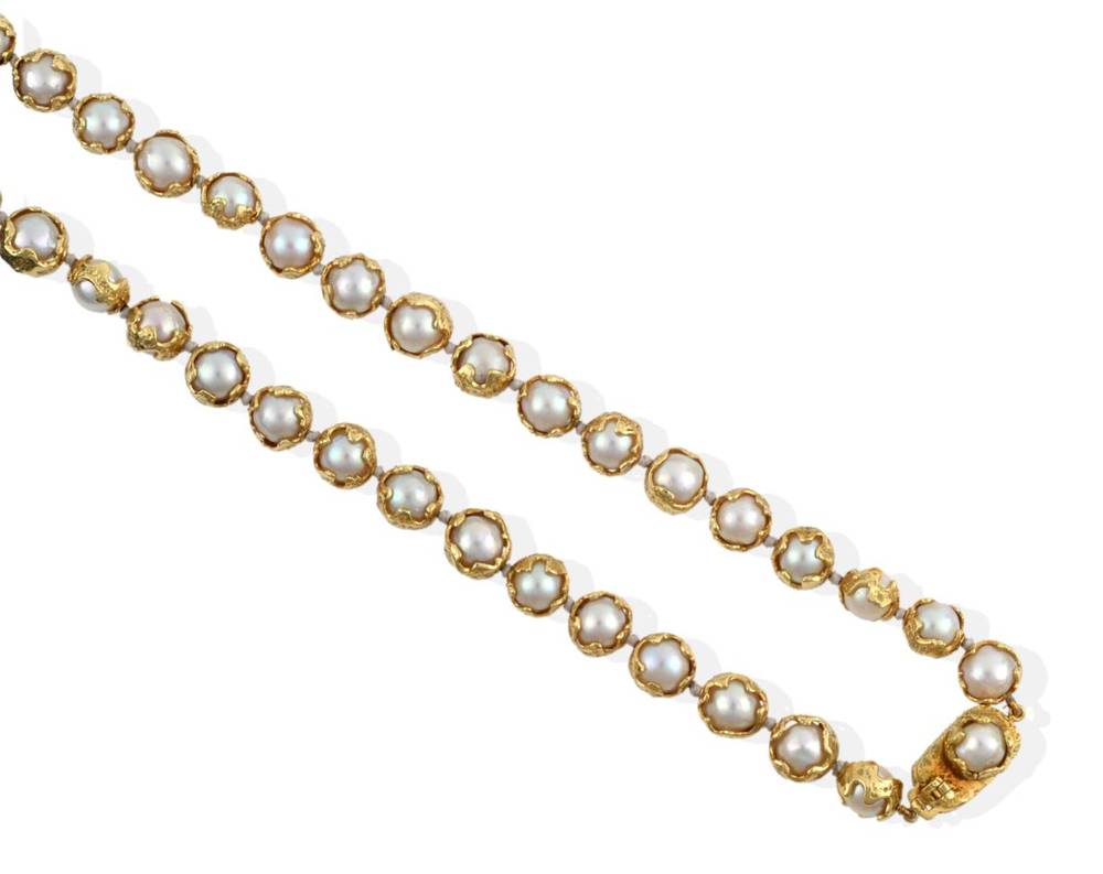Lot 113 - ^ An 18 Carat Gold Cultured Pearl Necklace, by Charles de Temple, cultured pearls in heavily...