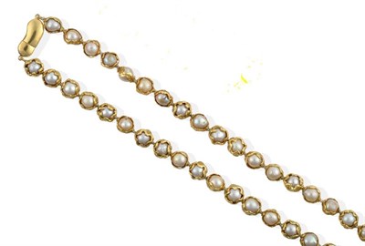 Lot 114 - ^ An 18 Carat Gold Cultured Pearl Necklace, by Charles de Temple, cultured pearls in heavily...