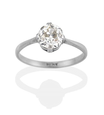 Lot 136 - A Diamond Solitaire Ring, the old cut diamond in four white double claws, to a tapered shoulder...