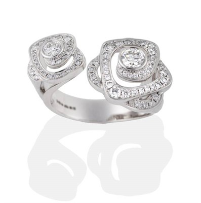 Lot 138 - A Platinum Diamond ''Maymay Rose'' Ring, by Boodles, two rose motifs pavé set with round brilliant