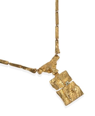 Lot 154 - An 18 Carat Gold Necklace, by Lapponia, the abstract form with a textured finish, a blue bi-pyramid
