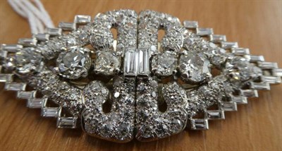 Lot 164 - ^ A Diamond Double Clip Brooch, a kite-shaped double plaque set throughout with old cut...