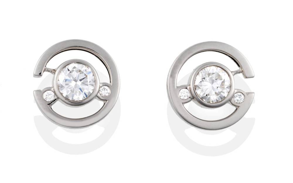 Lot 165 - A Pair of 18 Carat White Gold 'Maze' Earrings, by Boodles, three round brilliant cut diamonds...