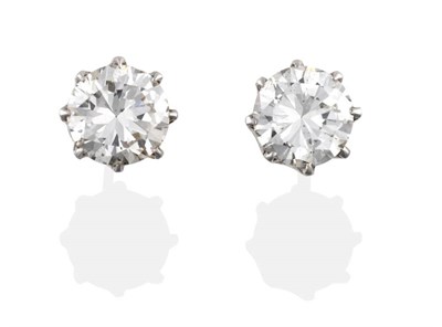 Lot 167 - ^ A Pair of Solitaire Diamond Earrings, round brilliant cut diamonds in white eight claw...