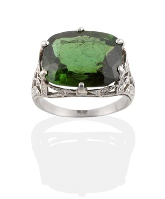 Lot 169 - A Green Tourmaline and Diamond Ring, the large cushion cut tourmaline in a six claw setting, to...