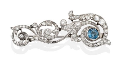 Lot 176 - An Early 20th Century Diamond and Blue Zircon Brooch, of scrolling design, set throughout with...