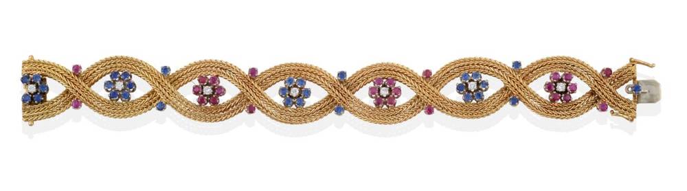 Lot 208 - A Ruby, Sapphire and Diamond Bracelet, the double foxtail link chain entwined along the length with