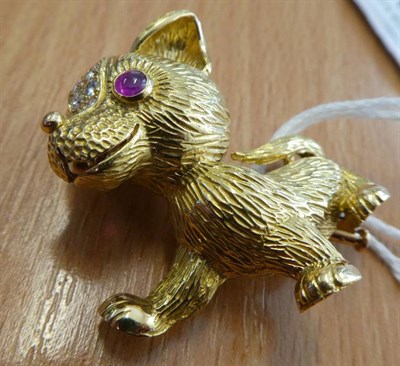 Lot 227 - ^ A 1960's Ruby and Diamond Novelty Dog Brooch, by Cartier, modelled in a walking pose, with...