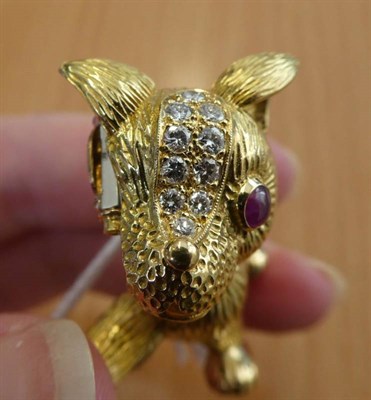 Lot 227 - ^ A 1960's Ruby and Diamond Novelty Dog Brooch, by Cartier, modelled in a walking pose, with...