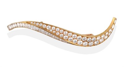Lot 234 - ^ A Diamond 'Flamme' Brooch, by Van Cleef & Arpels, a scroll pavé set with graduated round...
