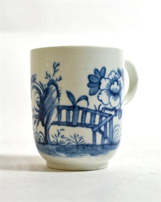Lot 507 - A Worcester Porcelain Coffee Cup, circa 1755, painted in underglaze blue with a fenced garden