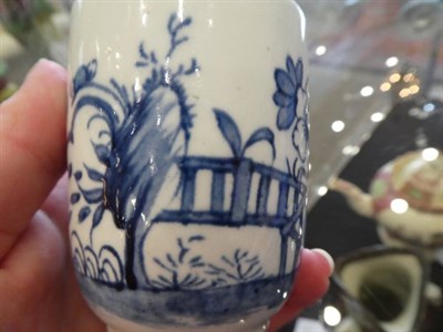 Lot 507 - A Worcester Porcelain Coffee Cup, circa 1755, painted in underglaze blue with a fenced garden