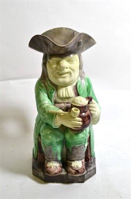 Lot 519 - A Ralph Wood Type Creamware Toby Jug, circa 1780, traditionally modelled wearing a tricorn hat...