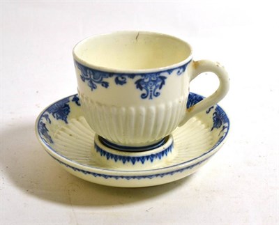 Lot 540 - A St Cloud Porcelain Coffee Cup and Trembleuse Saucer, circa 1740, of fluted form, painted in...
