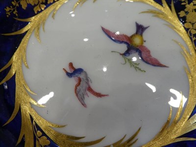 Lot 541 - A Vincennes Porcelain Coffee Can and Saucer, circa 1753, painted with birds in flight in gilt...