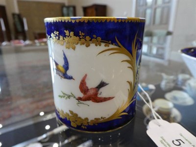 Lot 541 - A Vincennes Porcelain Coffee Can and Saucer, circa 1753, painted with birds in flight in gilt...