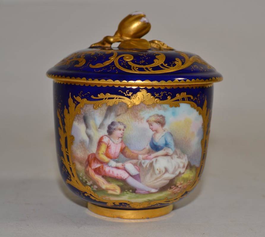 Lot 543 - A Sèvres Porcelain Sucrier and Cover, painted with romantic figures in landscape and with a...