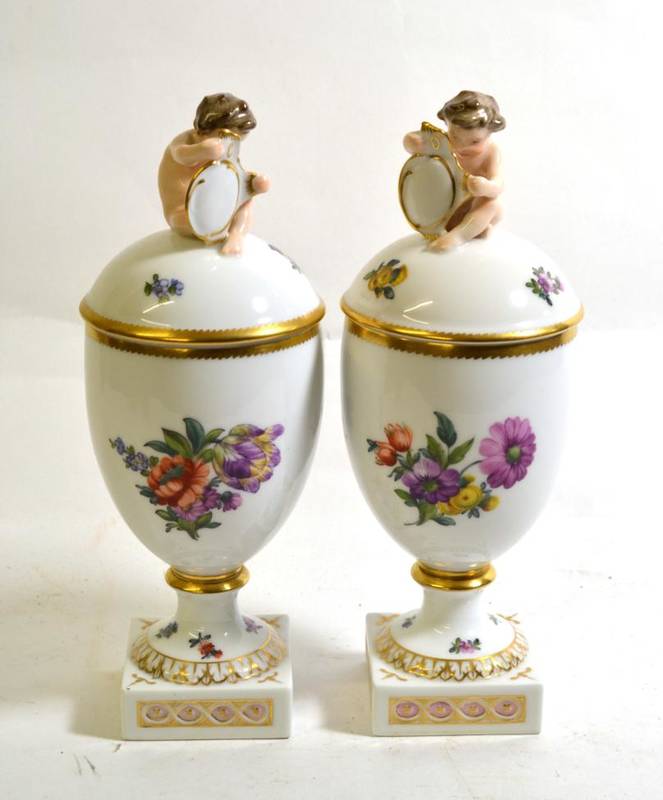 Lot 549 - ~ A Pair of Royal Copenhagen Porcelain Urn Shaped Vases and Covers, late 19th century, with...