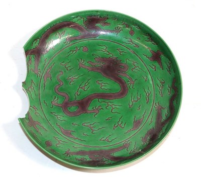 Lot 552 - A Chinese Porcelain Green Ground Aubergine Dragon Dish, Kangxi reign mark and of the period,...
