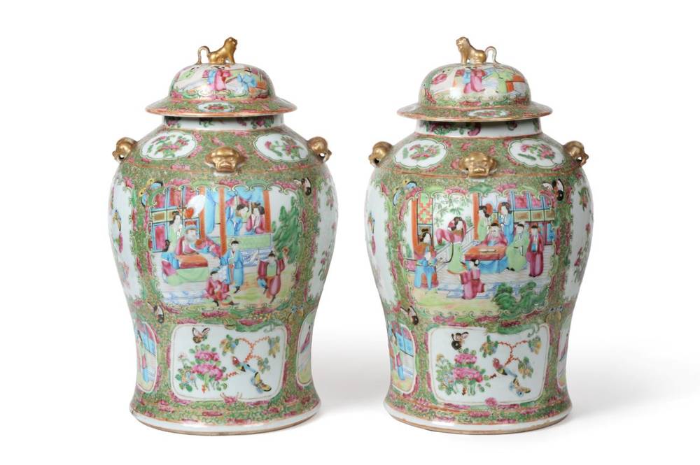 Lot 561 - A Pair of Cantonese Porcelain Baluster Jars and Covers, mid 19th century, with mythical beast...