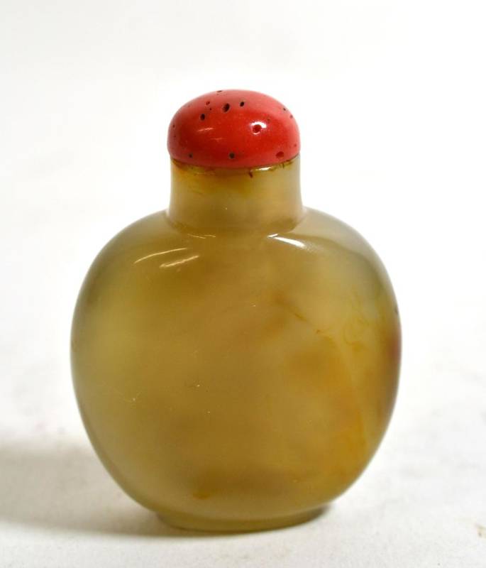 Lot 570 - A Chinese Agate Snuff Bottle, 19th century, of flattened ovoid form, 6.5cm high