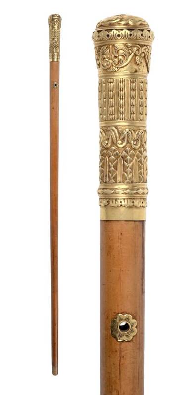 Lot 575 - A George III Gold Mounted Malacca Walking Cane, the handle with bands of classical foliate...