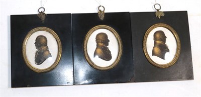 Lot 579 - John Miers (c.1758-1821): Miniature Silhouette Bust Portraits of Gentlemen, painted and bronzed...