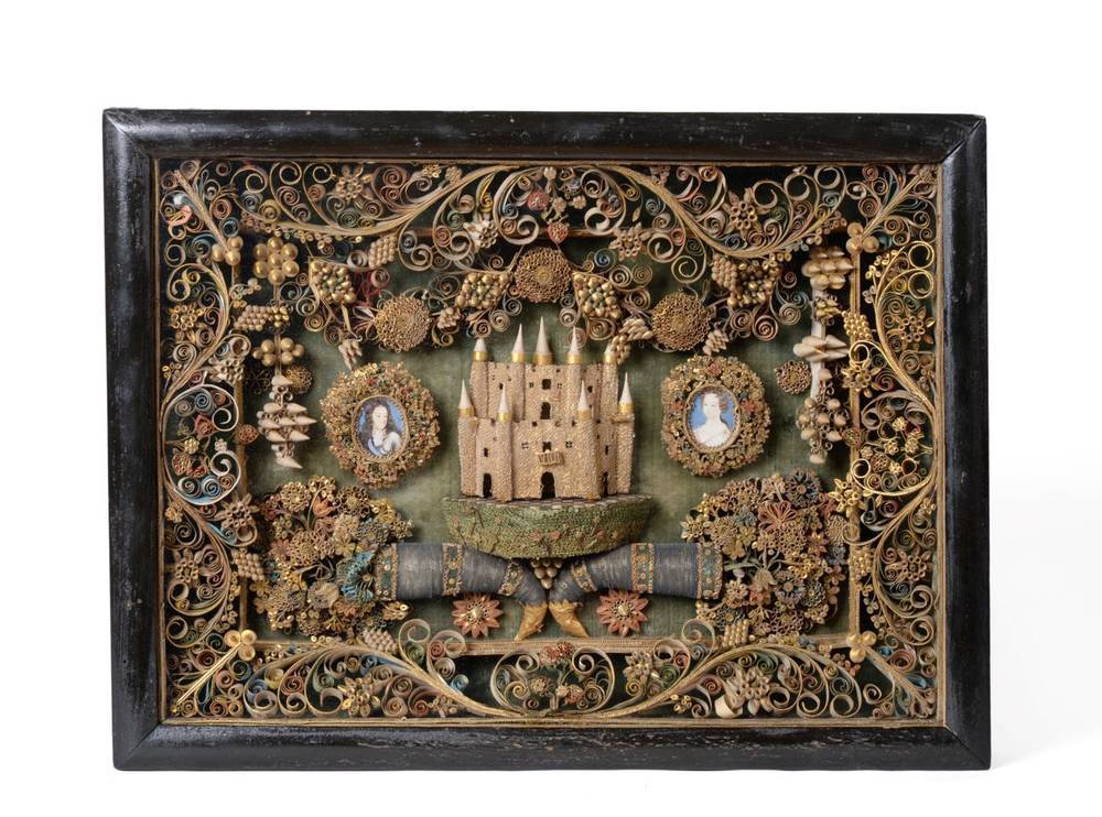 Lot 584 - A Quillwork Diorama, circa 1670, worked in coloured and gilt paper with a castle flanked by two...
