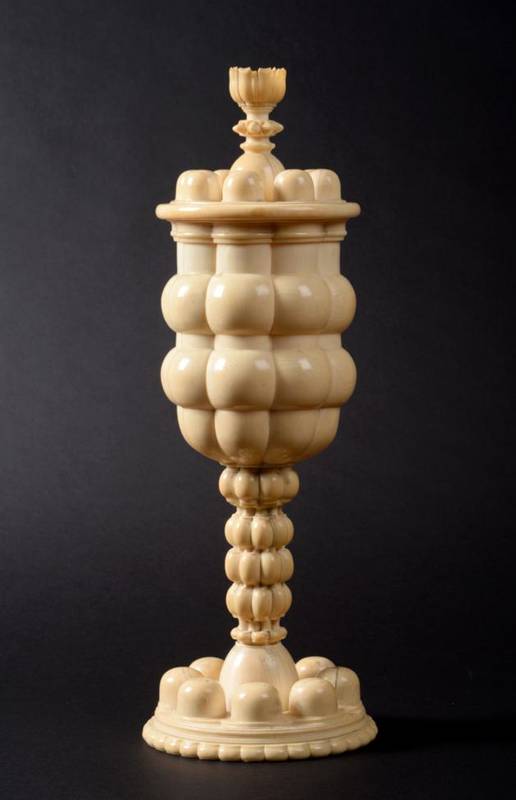 Lot 586 - A Turned Ivory Pedestal Cup and Cover, South Germany, 2nd half 17th century, of lobed ovoid form on