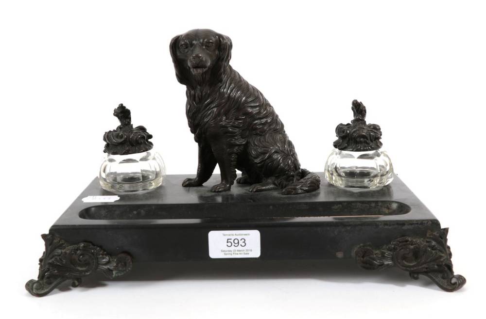Lot 593 - ~ A Bronze Mounted Slate and Glass Inkstand, mid 19th century, as a seated dog flanked by two...