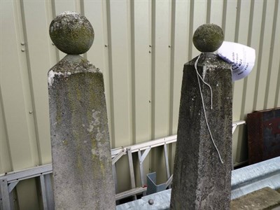 Lot 624 - ~ A Set of Four Sandstone Obelisks, after Classical originals, with ball finials, tapering...