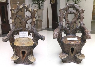 Lot 625 - Two Victorian Stoneware Garden Seats, modelled as entwined branches, 122cm high See illustration