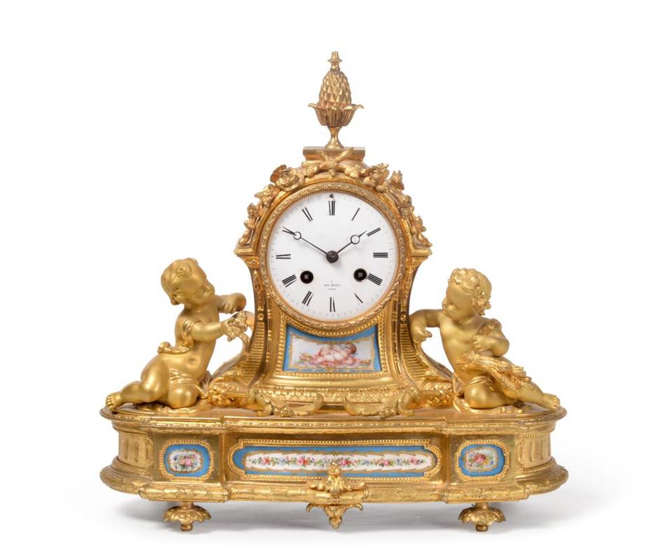 Lot 630 - An Ormolu and Porcelain Striking Mantel Clock, signed Hry Marc, Paris, circa 1880, pineapple...