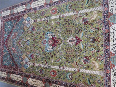Lot 645 - Indo-Persian Prayer Rug India, modern The olive green field with birds and vines beneath a...