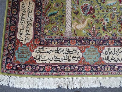 Lot 645 - Indo-Persian Prayer Rug India, modern The olive green field with birds and vines beneath a...
