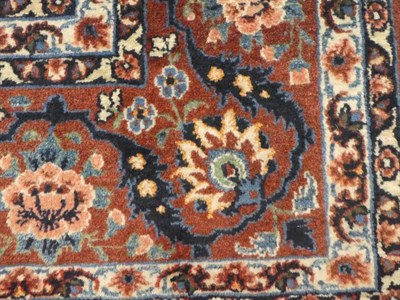 Lot 653 - Isfahan Rug Central Iran, circa 1950 The ivory lattice field of semi-naturalistic flowers...