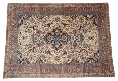 Lot 662 - Tabriz Carpet Iranian Azerbaijan, circa 1930 The ivory field of flowering vines around an...