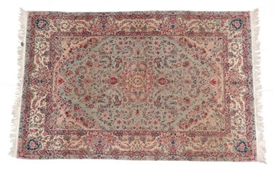 Lot 664 - Fine Oriental Rug, possibly Tabriz The celadon field of palmettes and vines centred by a...