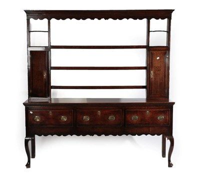 Lot 669 - A George III Oak and Mahogany Crossbanded Low Dresser and Rack, early 19th century, the upper...