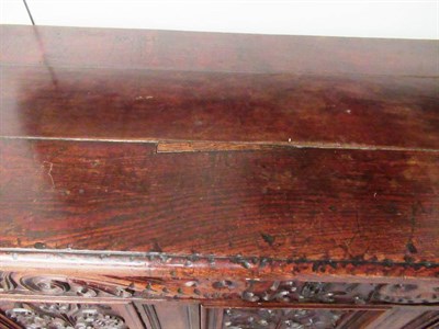 Lot 671 - A Late 17th Century Joined Oak Chest, the boarded hinged lid above a carved frieze dated 1686...