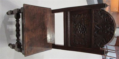 Lot 673 - Six Lancashire Joined Oak Chairs, the domed top panel backs carved with leafy plants between...