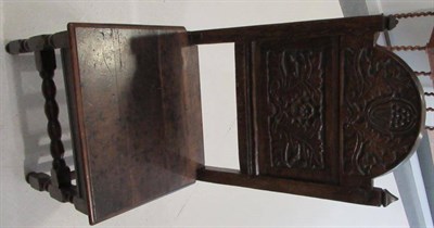 Lot 673 - Six Lancashire Joined Oak Chairs, the domed top panel backs carved with leafy plants between...
