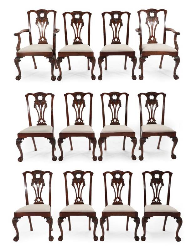 Lot 749 - A Set of Twelve Mahogany Chippendale Revival Dining Chairs, 20th century, retailed by...