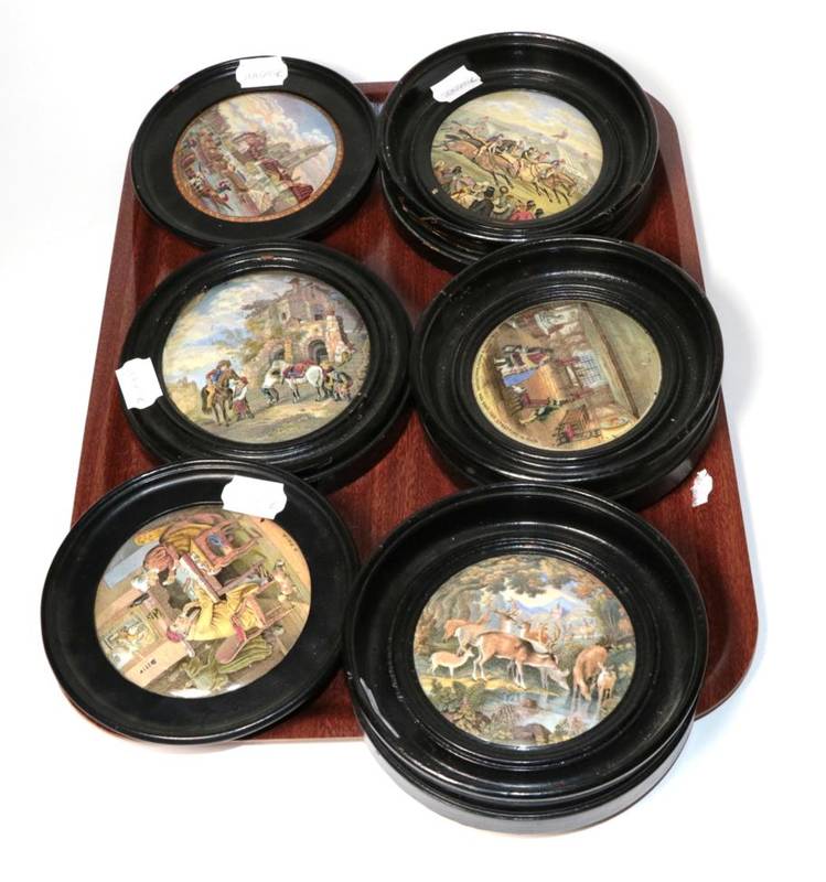 Lot 40 - A collection of six Pratt ware pot lids in ebonised frames, including a horse racing example