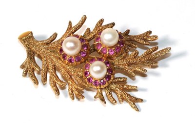 Lot 49 - A cultured pearl and ruby floral brooch, three cultured pearls within ruby petal borders, to...
