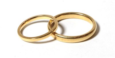 Lot 86 - Two 18 carat gold band rings, finger sizes L and S1/2