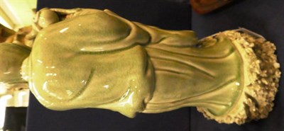 Lot 101 - A Chinese celadon glazed figure of an immortal with a ceramic gourd-form teapot (2)
